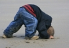 Photo Enfant caché dans le sable